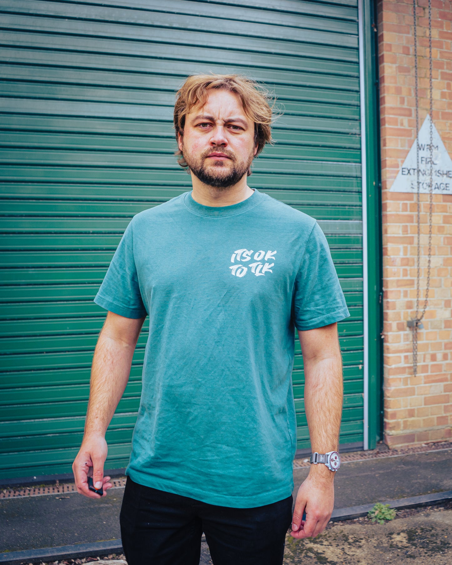 It’s Ok To Tlk paint style tee.