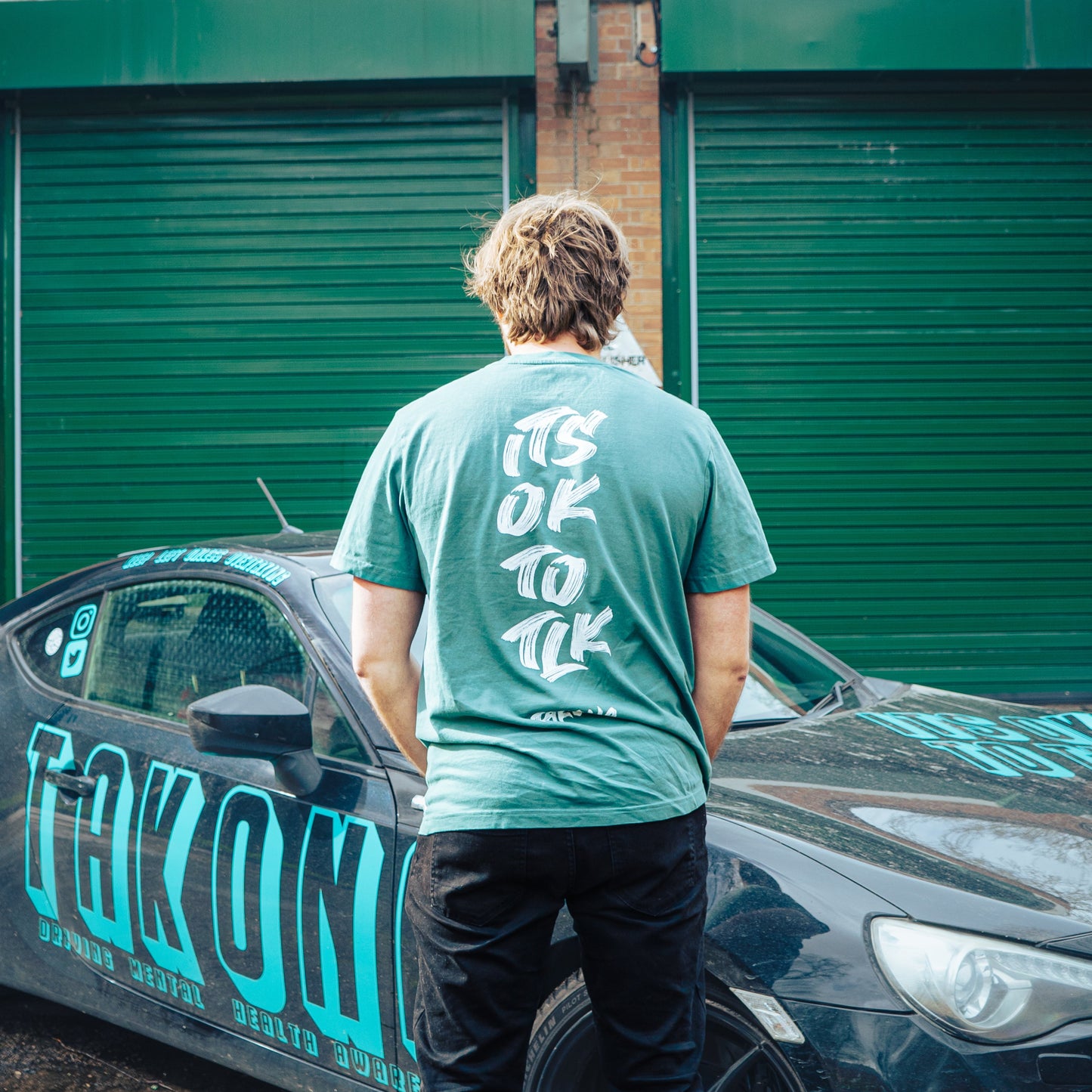 It’s Ok To Tlk paint style tee.