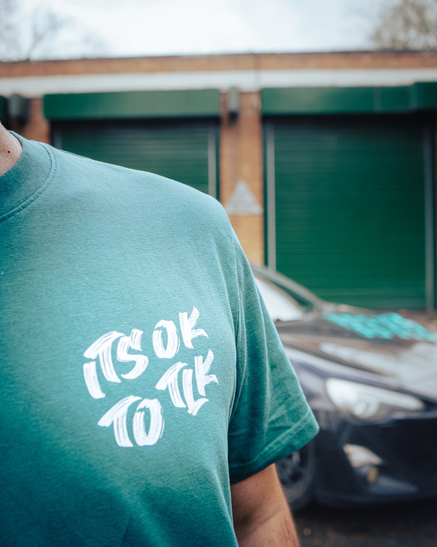 It’s Ok To Tlk paint style tee.